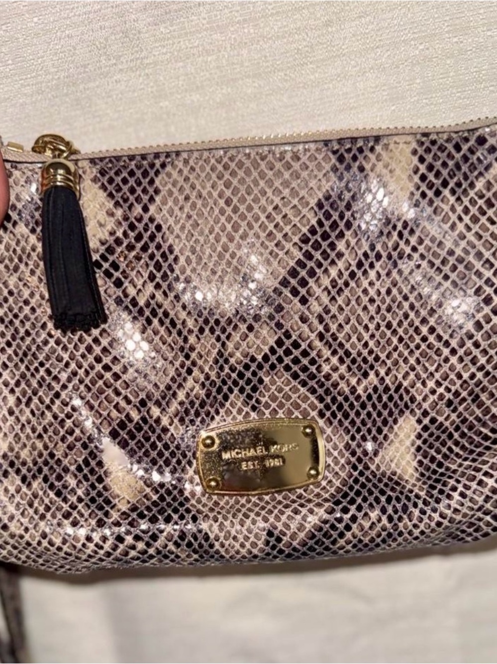 Michael Kors Pink Snake-Print Wristlet with Black Tassel and Gold Hardware